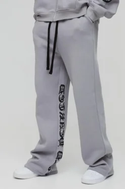 Hot boohooMAN Tall Relaxed Flare Cold Hearted Puff Print Gusset Jogger grey marl