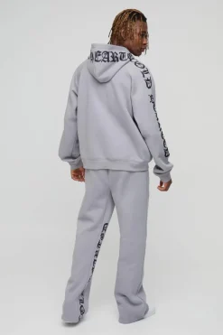 Hot boohooMAN Tall Relaxed Flare Cold Hearted Puff Print Gusset Jogger grey marl