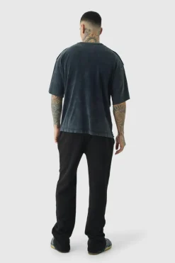 Online boohooMAN Tall Relaxed Worldwide Cross Jogger black