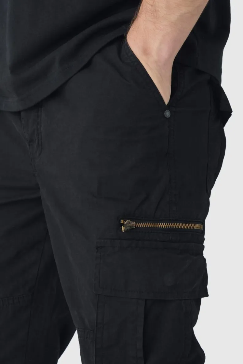 Hot boohooMAN Tall Slim Flare Zip Gusset Overdye Acid Wash Cargo Trouser In black