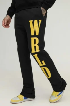 Shop boohooMAN Tall Slim Stacked Wrld Print Gusset Jogger black