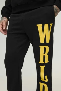 Shop boohooMAN Tall Slim Stacked Wrld Print Gusset Jogger black