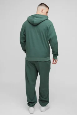 Store boohooMAN Tall Spray Wash Waffle Graphic Hooded Tracksuit green