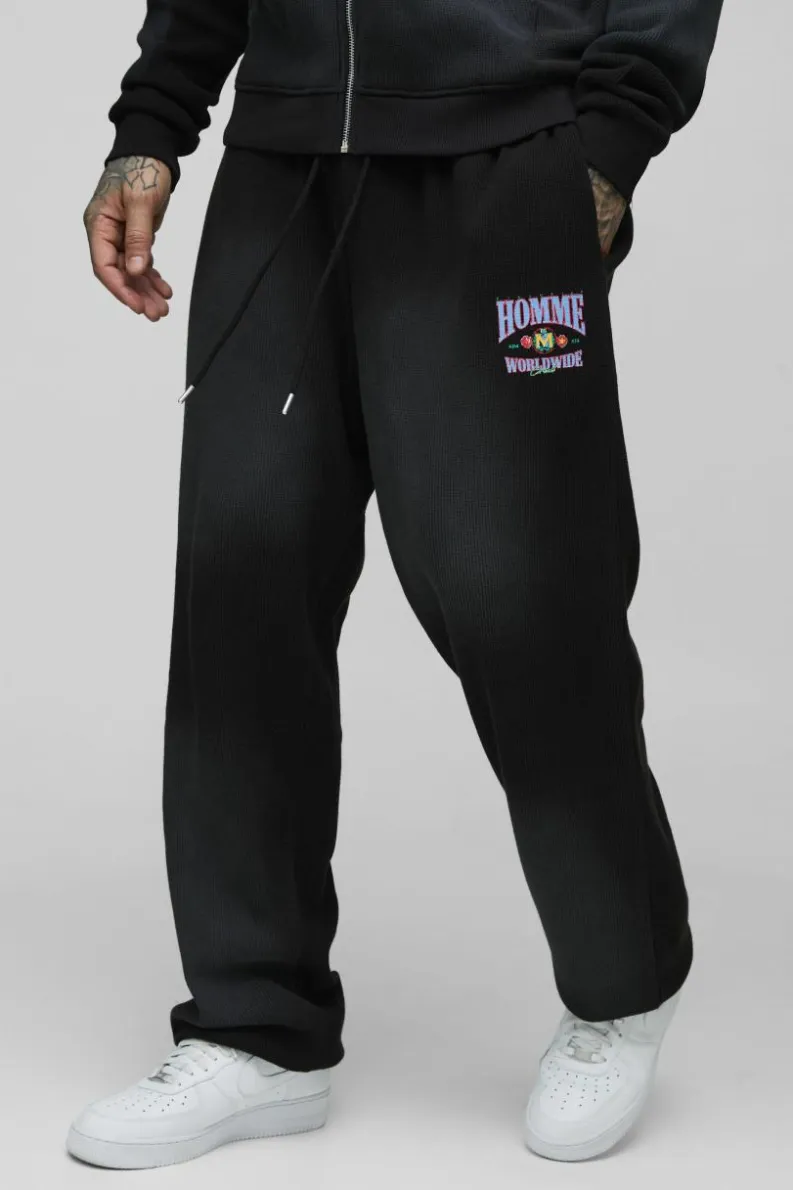 Fashion boohooMAN Tall Spray Wash Waffle Graphic Oversized Jogger washed black