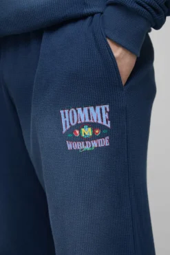 Fashion boohooMAN Tall Spray Wash Waffle Graphic Oversized Jogger navy