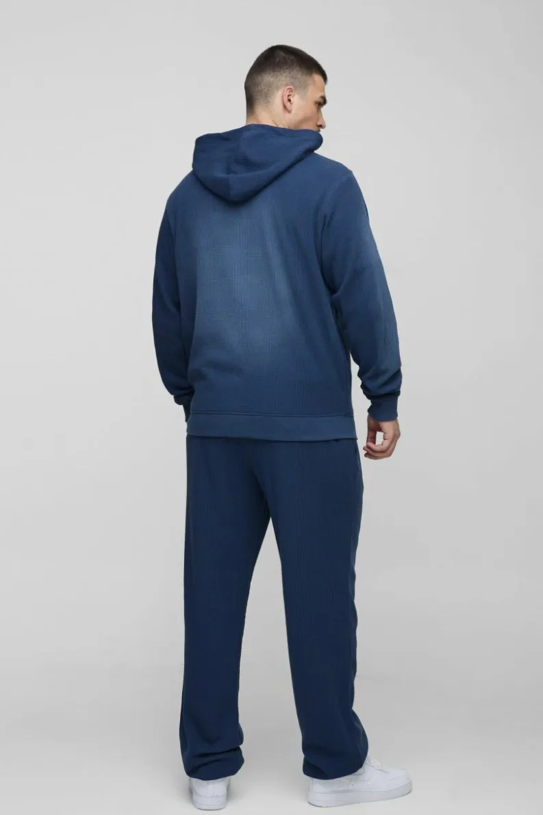 Shop boohooMAN Tall Spray Wash Waffle Graphic Zip Up Hoodie navy