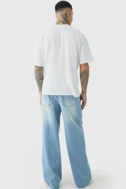 New boohooMAN Tall Star Applique Baggy Fit Jeans antique blue