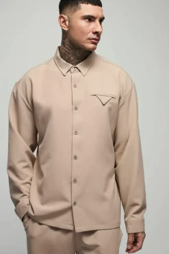 Shop boohooMAN Tall Stretch Woven Pocket Detail Oversized Shirt stone