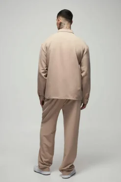 Shop boohooMAN Tall Stretch Woven Pocket Detail Oversized Shirt stone