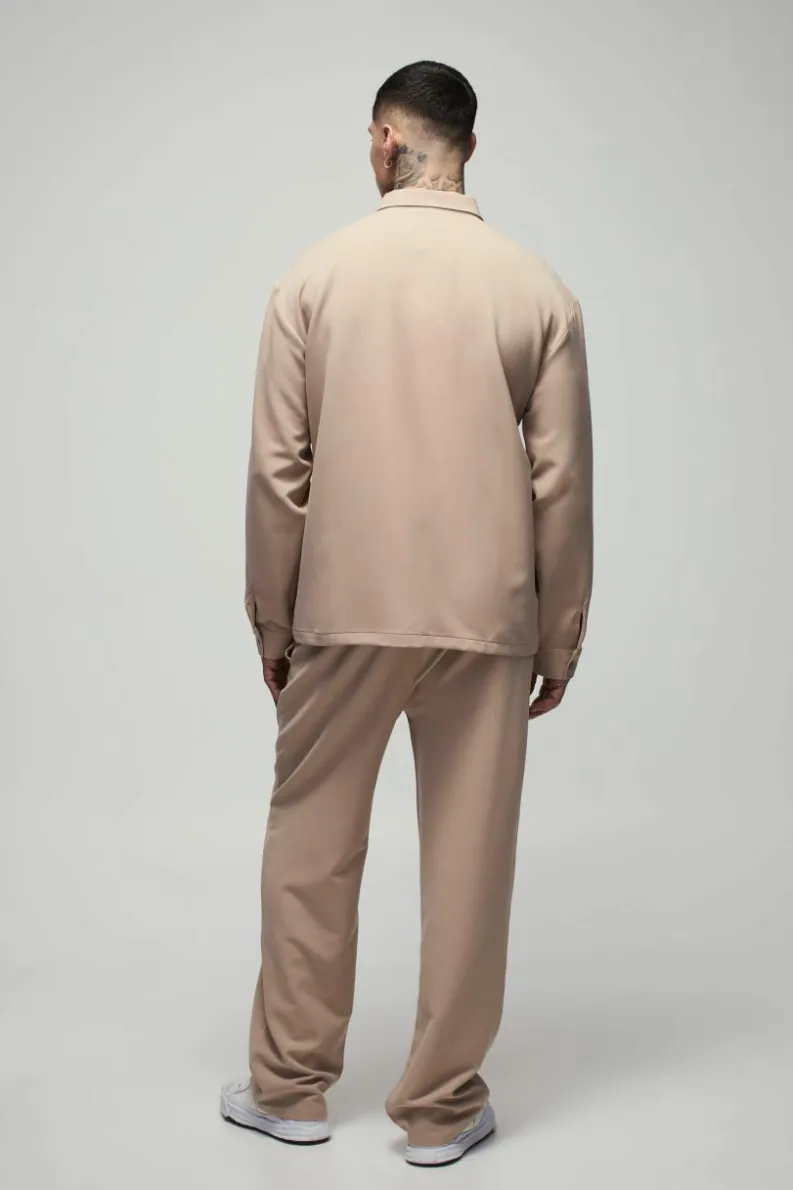 Shop boohooMAN Tall Stretch Woven Pocket Detail Oversized Shirt stone