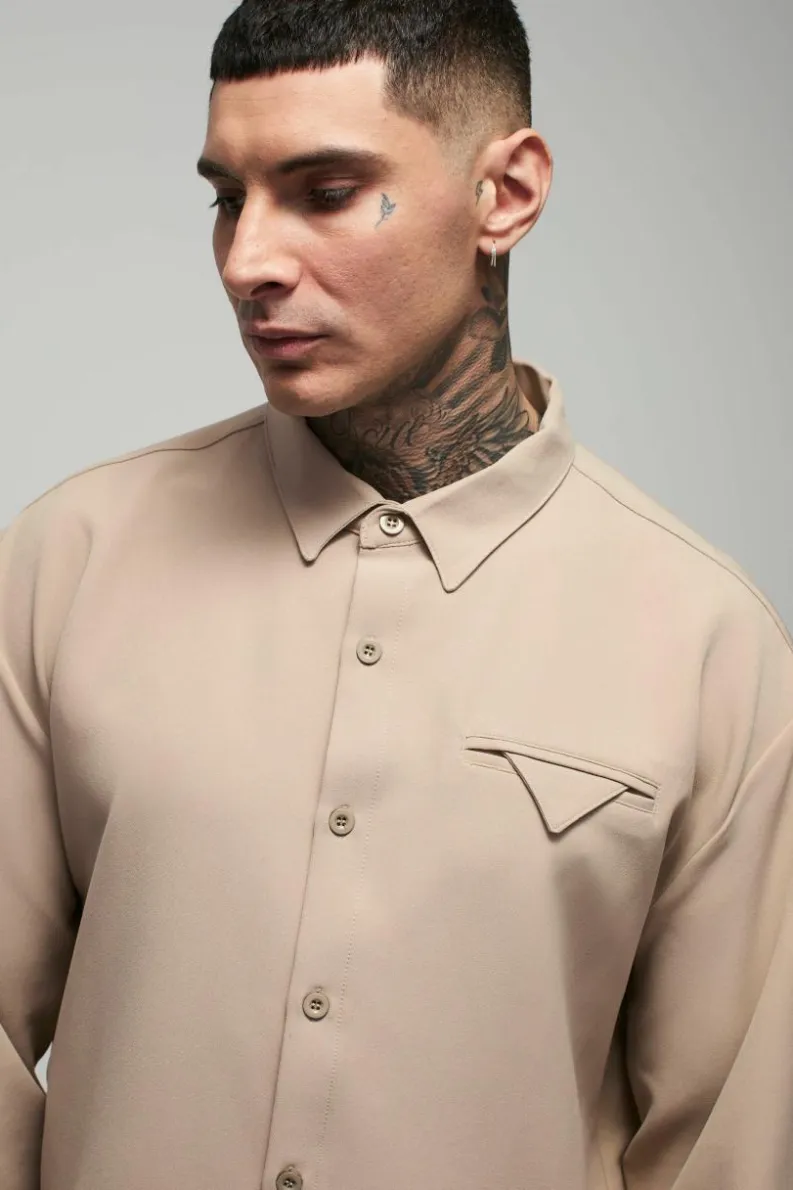 Shop boohooMAN Tall Stretch Woven Pocket Detail Oversized Shirt stone