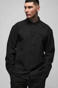 Shop boohooMAN Tall Stretch Woven Pocket Detail Oversized Shirt black