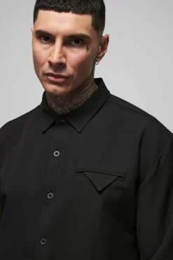 Shop boohooMAN Tall Stretch Woven Pocket Detail Oversized Shirt black