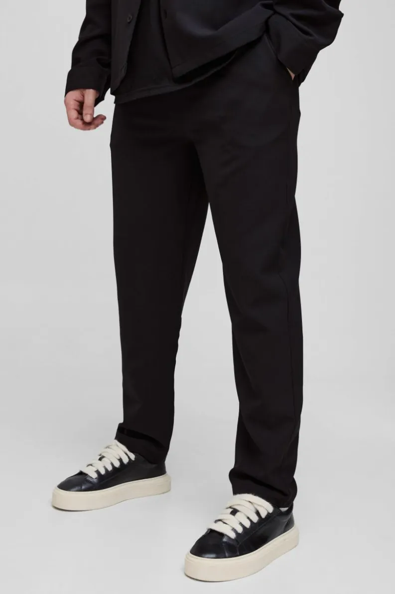 Store boohooMAN Tall Stretch Woven Tapered Trousers black