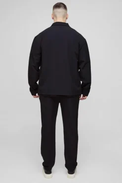 Store boohooMAN Tall Stretch Woven Tapered Trousers black