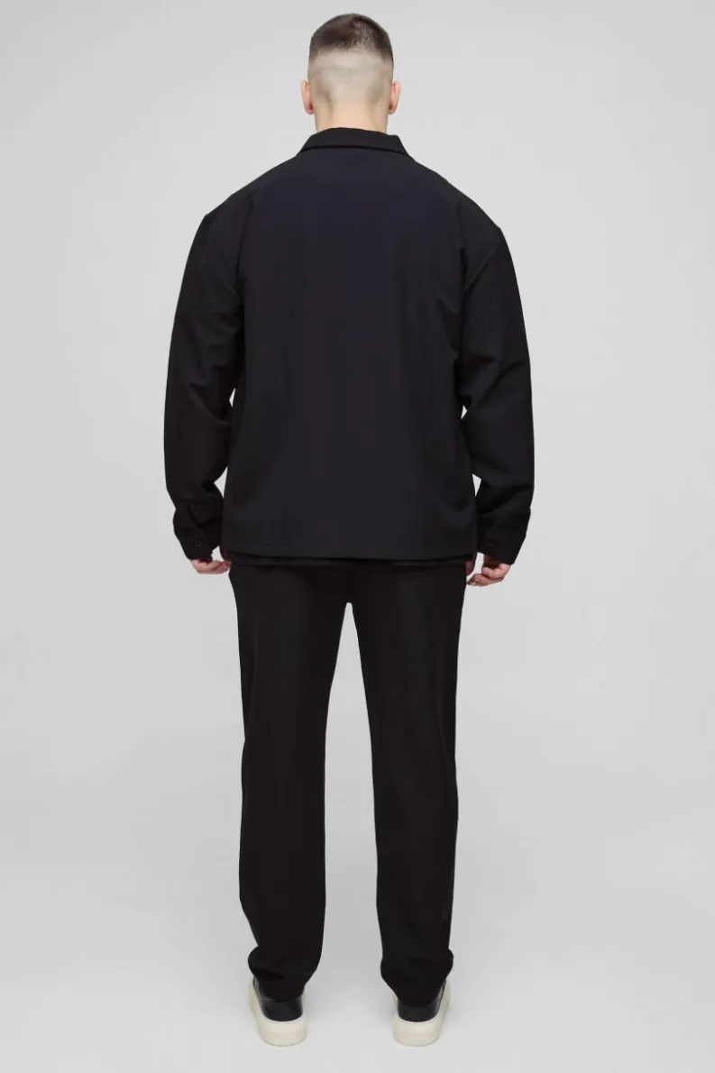 Store boohooMAN Tall Stretch Woven Tapered Trousers black