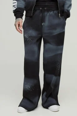 Sale boohooMAN Tall Wide Fit Boxer Spray Wash Embroidered Split Hem Jogger black