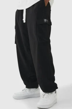 Online boohooMAN Tall Woven Tab Oversized Fit Cargo Joggers black