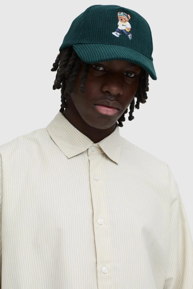 Shop boohooMAN Teddy Cord Cap forest