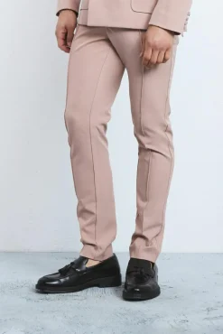 Shop boohooMAN Textured Adjustable Waist Skinny Suit Trousers pink