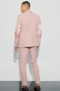 Shop boohooMAN Textured Adjustable Waist Skinny Suit Trousers pink