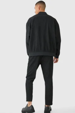 Shop boohooMAN Textured Satin Oversized Bomber Jacket black
