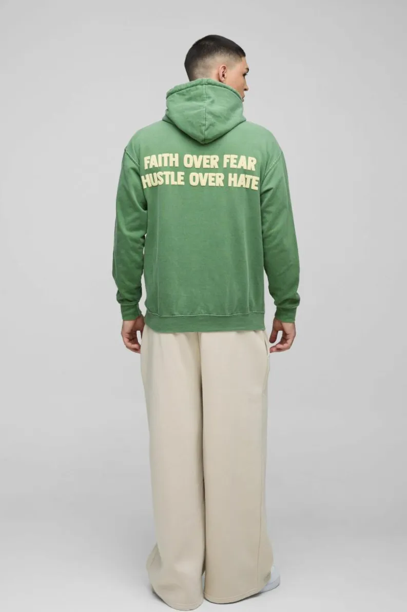 Shop boohooMAN Washed Faith Over Fear Text Puff Print Graphic Hoodie forest