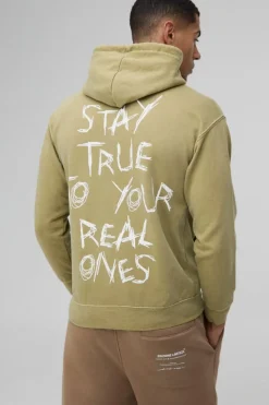 Shop boohooMAN Washed Stay True Text Graphic Hoodie olive