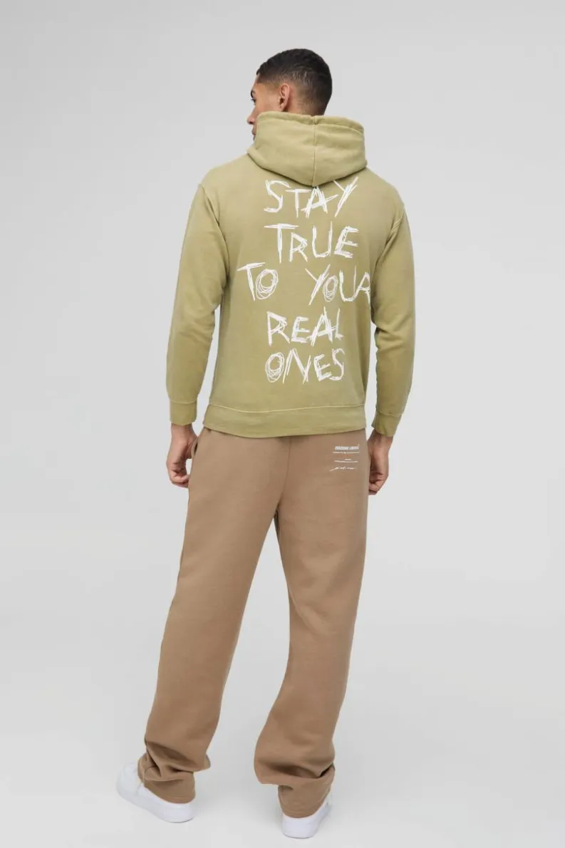 Shop boohooMAN Washed Stay True Text Graphic Hoodie olive