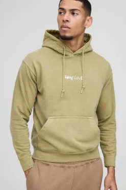 Shop boohooMAN Washed Stay True Text Graphic Hoodie olive