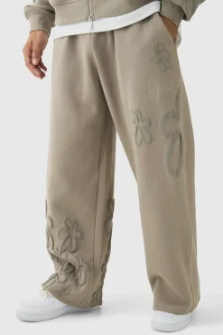 Best boohooMAN Wide Fit Floral Puff Print Jogger taupe