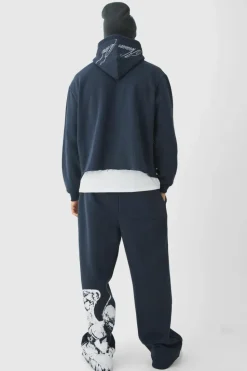 Online boohooMAN Wide Fit Renaissance Graphic Joggers slate blue