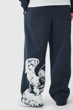 Online boohooMAN Wide Fit Renaissance Graphic Joggers slate blue