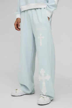Discount boohooMAN Wide Leg Limited Edition Cross Applique Joggers light blue