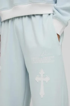 Discount boohooMAN Wide Leg Limited Edition Cross Applique Joggers light blue