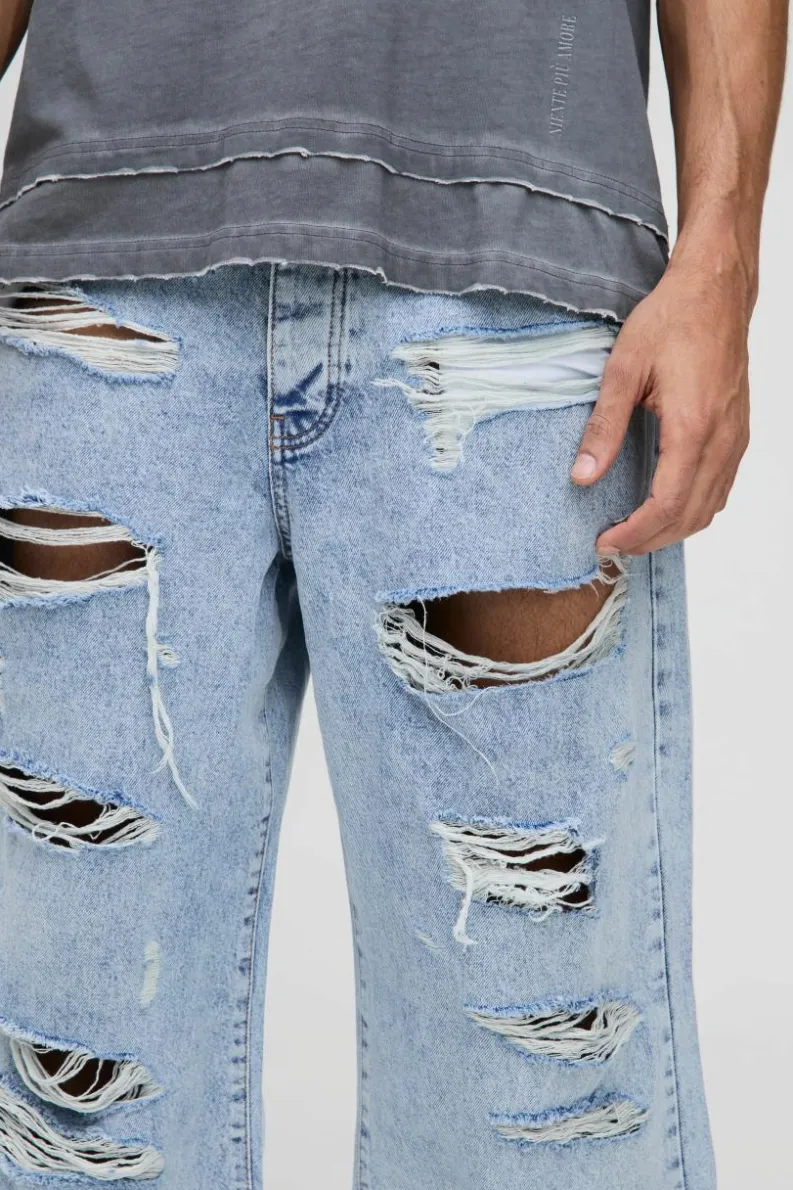 New boohooMAN Wide Leg Skater All Over Ripped Distressed Jeans light blue