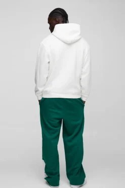 Store boohooMAN Wide Leg Varsity Mesh Applique Jogger forest