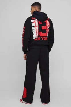 Shop boohooMAN Wide Leg Varsity Mesh Applique Jogger black