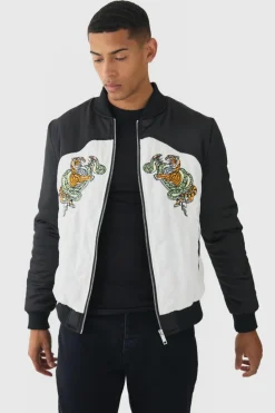 Online boohooMAN Worldwide Satin Quilted Padded Bomber Jacket In black