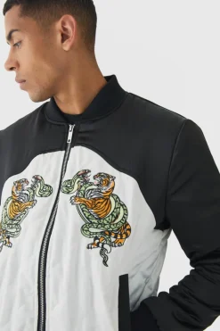 Online boohooMAN Worldwide Satin Quilted Padded Bomber Jacket In black